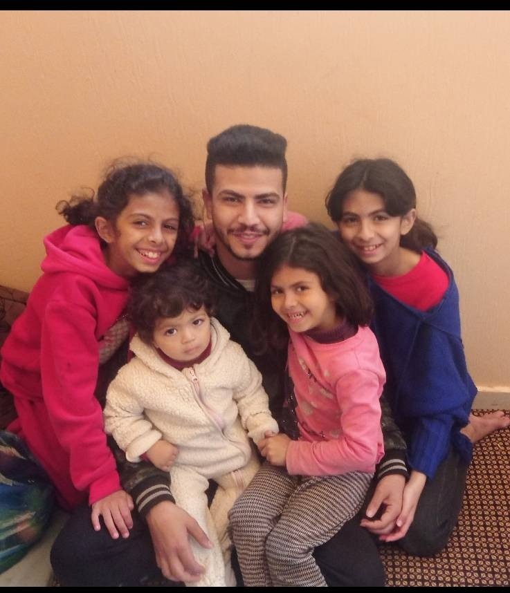 
            Mohammed with four of his nieces in better times
            